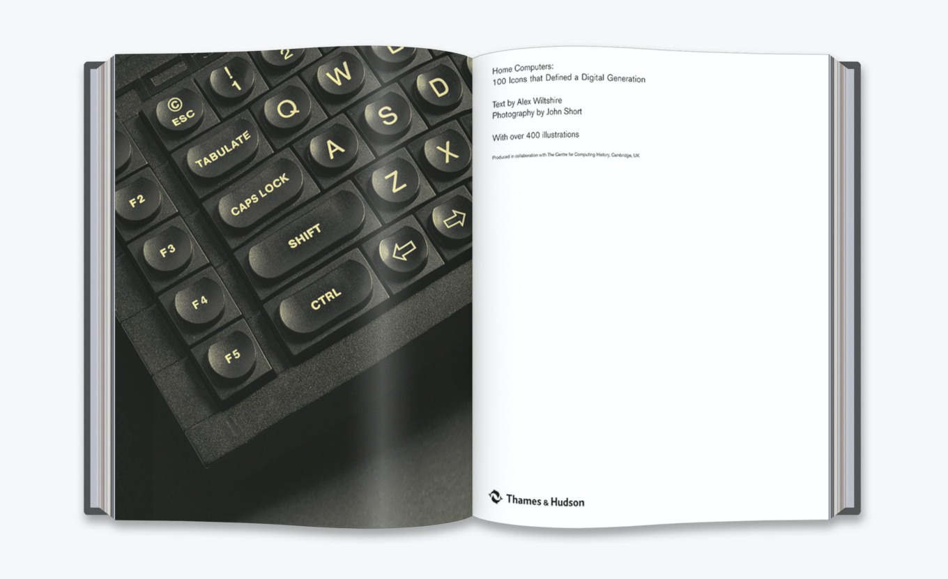 A photograph of the book’s opening pages, with a close-up photograph of a Spectrum QL keyboard